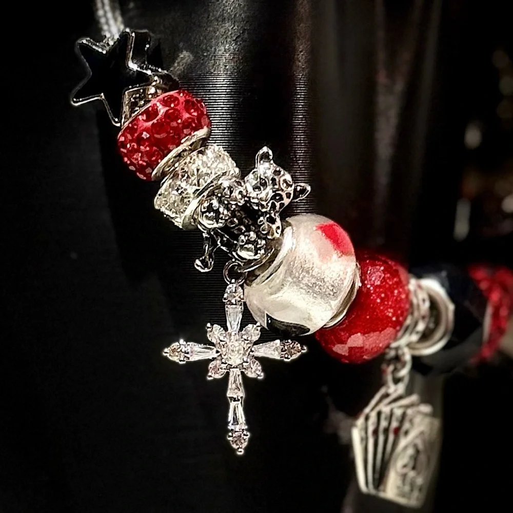 Elegant Charm Bracelet with Red and Black Accents